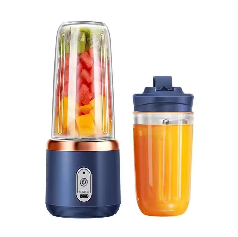 Best compact portable juicer with blue base and detachable bottle filled with fresh fruit juice