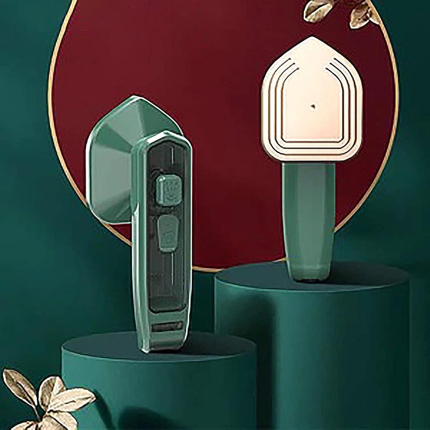 Green portable clothes steamer with ergonomic handle displayed on dark green pedestals