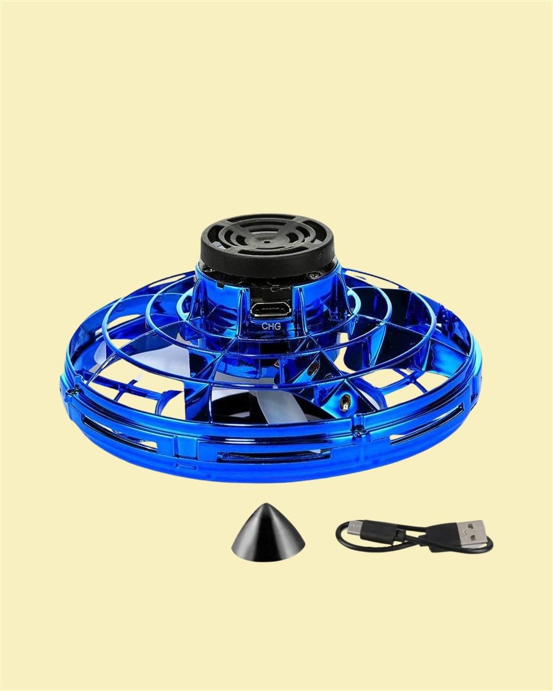 Blue magic flying orb toy with protective outer cage and USB charging cable on light background
