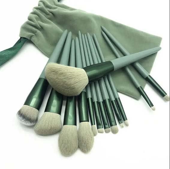 Soft bristle professional makeup brush set with green handles and matching drawstring pouch