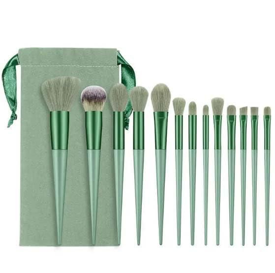 Soft bristle professional makeup brush set with green handles and matching green pouch for easy storage