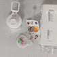 Cute straw water bottle for boys & girls with removable lid and colorful accessories on white background