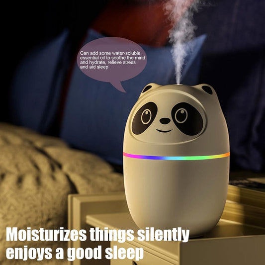 Cute panda shaped mini cool mist humidifier for room with colorful LED light releasing mist on bedside table