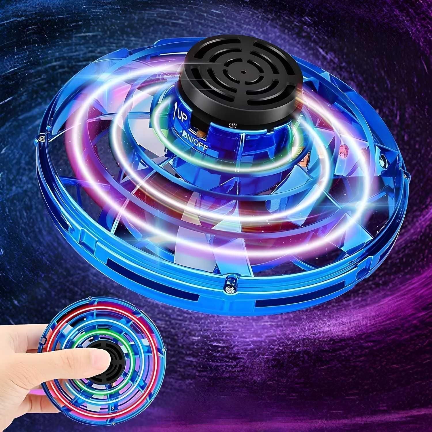 Blue magic flying orb toy hovering with glowing LED lights and hand holding a smaller orb