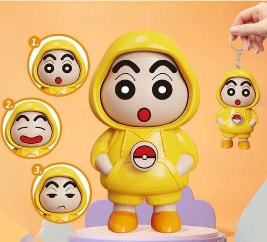 Shinchan cartoon keychain India with yellow hoodie and three facial expressions in hand and standing pose