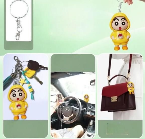 Shinchan cartoon keychain India in yellow hoodie attached to keys car dashboard and red handbag