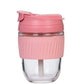 Eco friendly glass tumbler India with pink silicone lid and grip for reusable beverage container